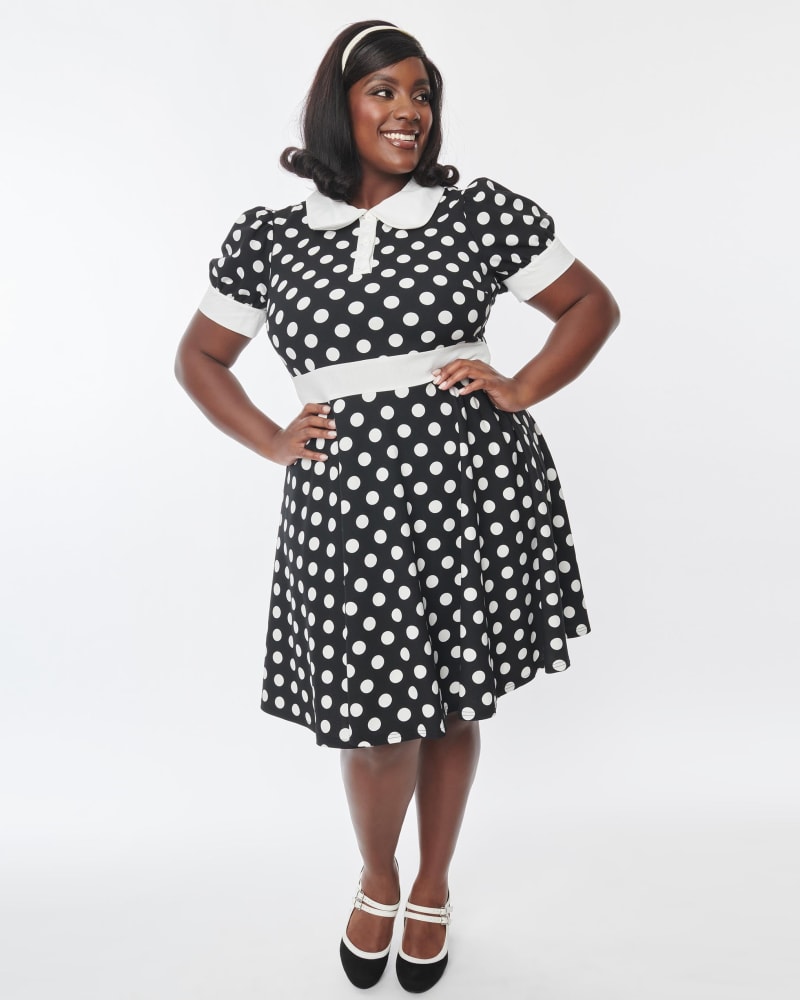 Front of a model wearing a size 1X Smak Parlour Black & White Polka Dot Print Flare Dress in Black, Polka Dot by Smak Parlour. | dia_product_style_image_id:286902